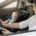 when can kids sit in the front seat ontario